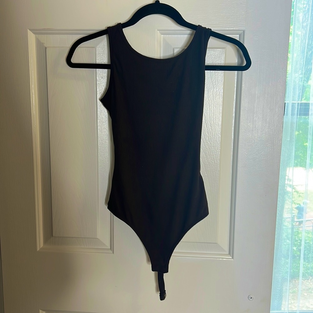 Brown body suit